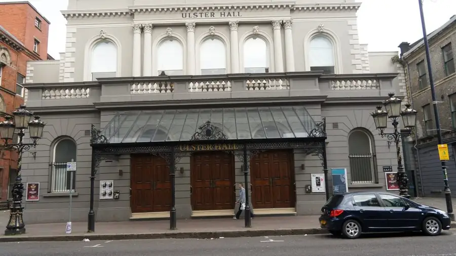 Ulster Hall in Belfast: the Victorian front with its name over an iron and glass canopy.