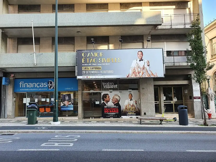 The front of the Teatro Villaret on Avenida Fontes Pereira de Melo, Lisbon, show posters over the entrance