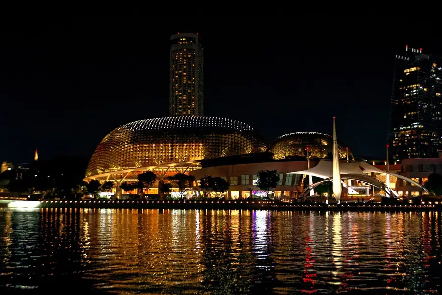 Stand-up comedy in Singapore: Esplanade – Theatres on the Bay lit up at night on Marina Bay, home of the Just For Laughs All Star Gala
